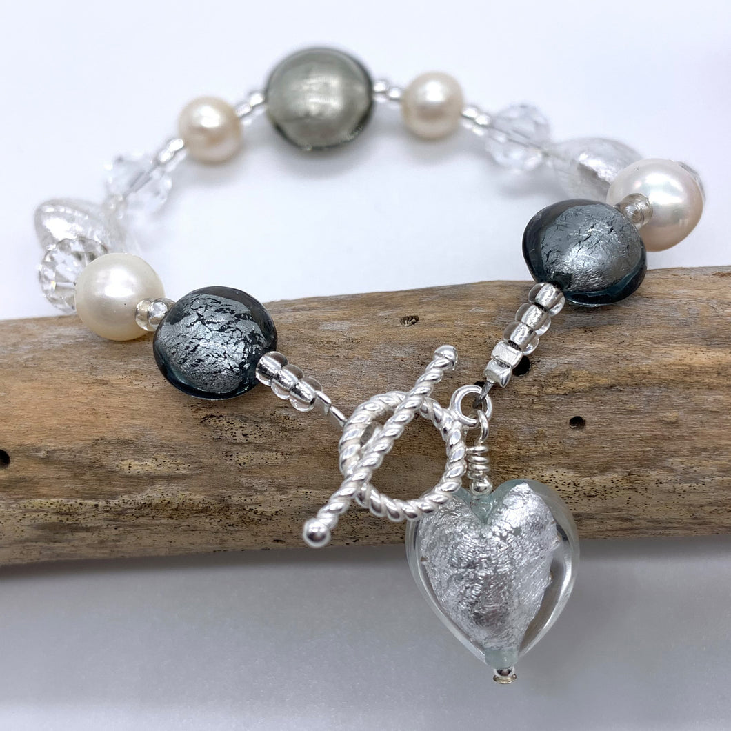Bracelet with grey and clear crystal Murano glass beads, Swarovski© crystals, pearls, charm