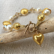 Bracelet with light gold Murano glass beads, Swarovski© crystals, pearls and heart charm