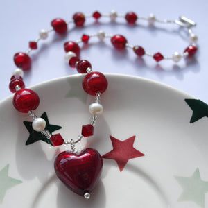 Necklace with red Murano glass beads, Swarovski© crystals, pearls, heart pendant