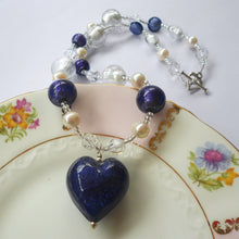 Necklace with purple velvet, lilac Murano glass beads, Swarovski© crystals, pearls, heart