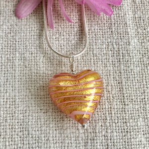 Necklace with pink spiral and gold Murano glass medium heart pendant on silver chain