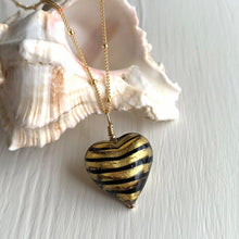 Necklace with black spiral and gold Murano glass medium heart pendant on gold chain