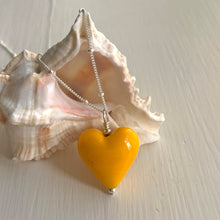Necklace with dark yellow pastel Murano glass medium heart pendant on silver chain