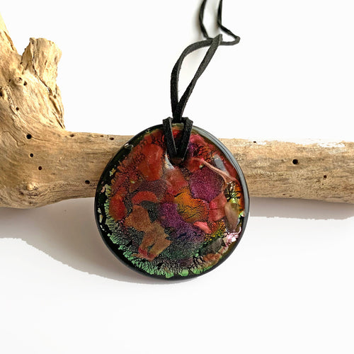 Necklace with shades of green and ruby on black Murano glass circular large flat pendant