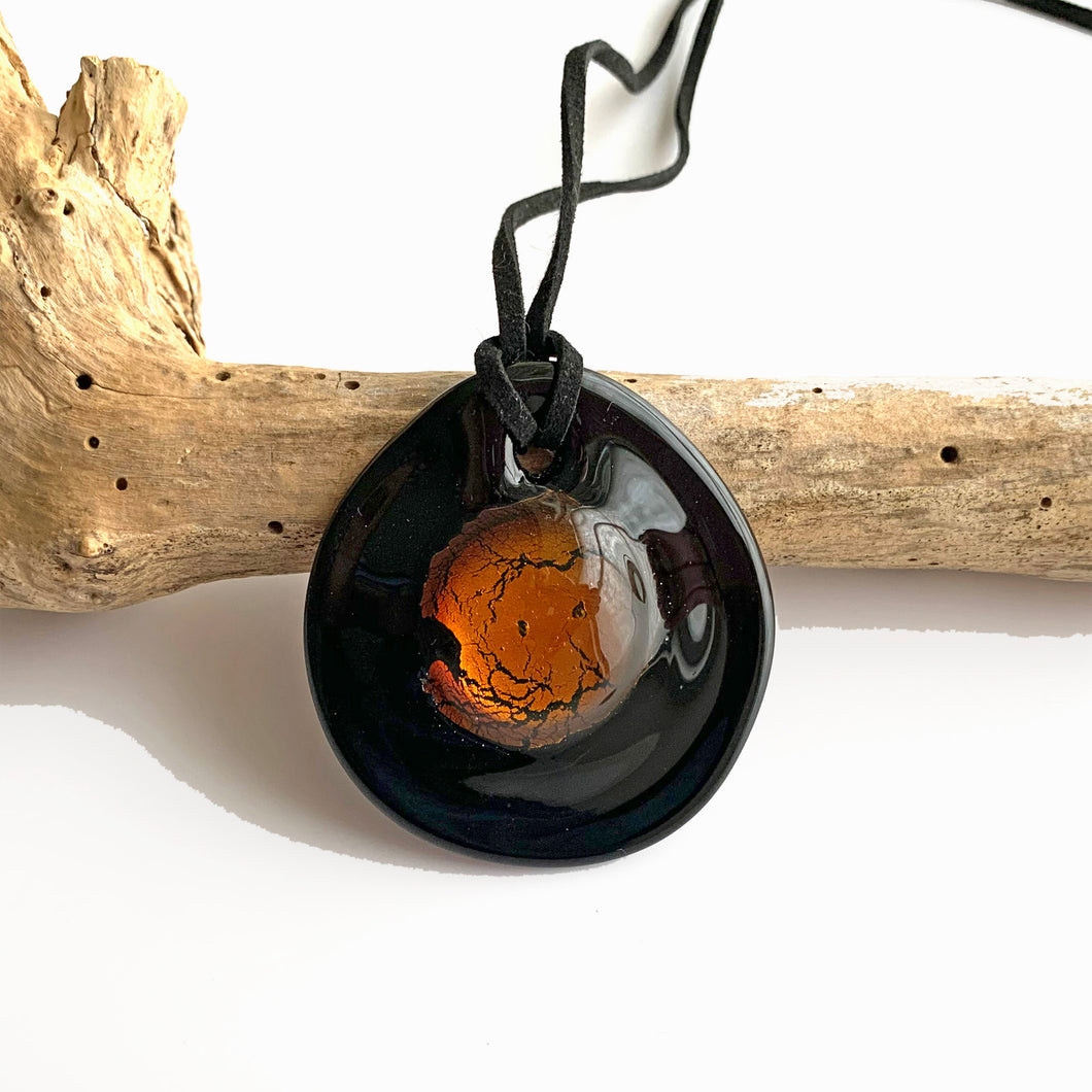 Necklace with amber (brown) and silver on black Murano glass circular dome pendant