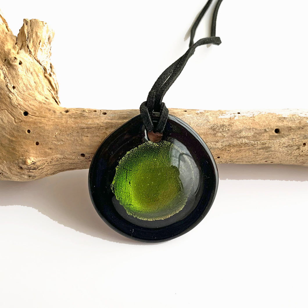 Necklace with light green and silver on black Murano glass near circular large dome pendant