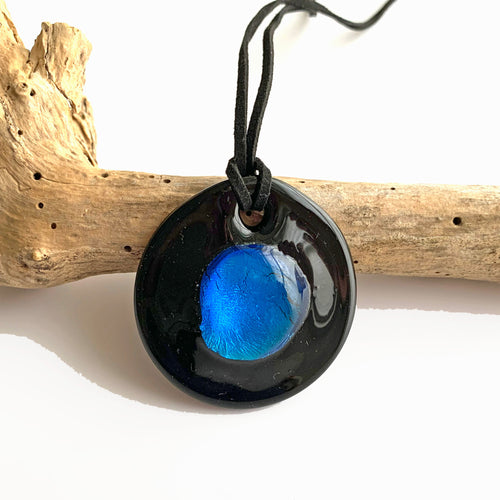 Necklace with cornflower blue and silver on black Murano glass near circular dome pendant