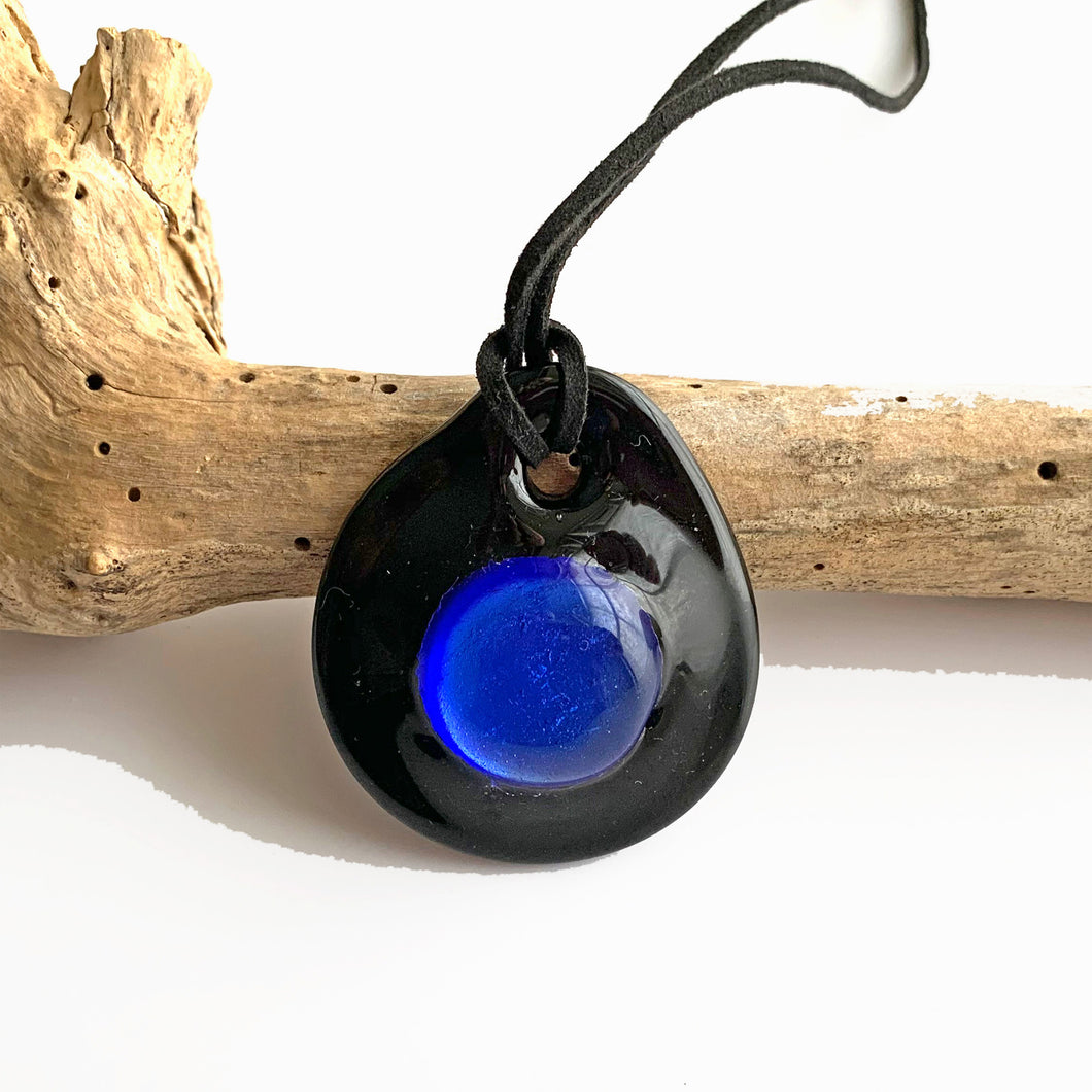 Necklace with turquoise (blue) and silver on black Murano glass near circular dome pendant