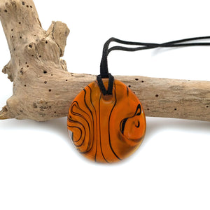 Necklace with orange pastel Murano glass near circular medium flat pendant