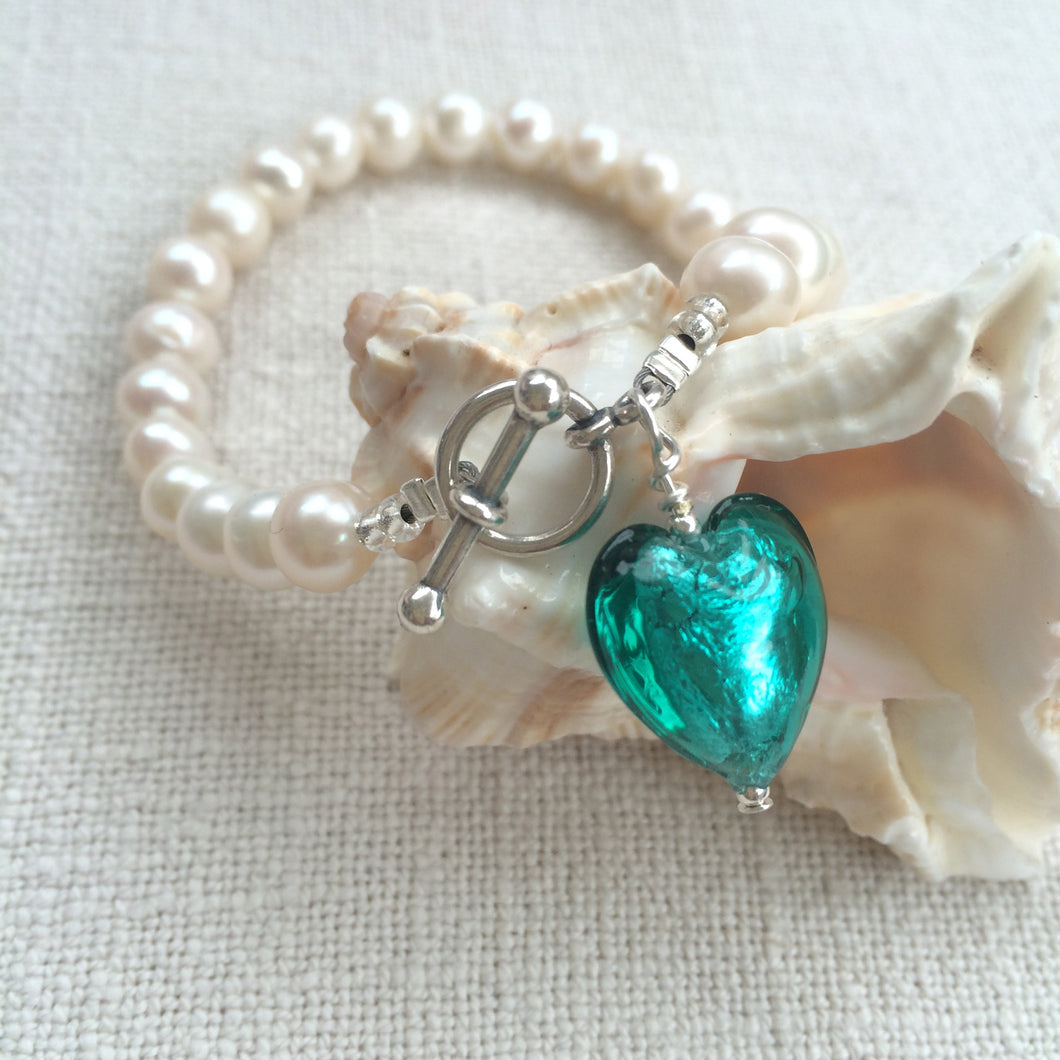 Bracelet with teal (green, jade) Murano glass small heart charm on white pearls