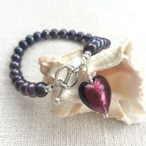 Bracelet with dark amethyst (purple) Murano glass small heart charm on black pearls