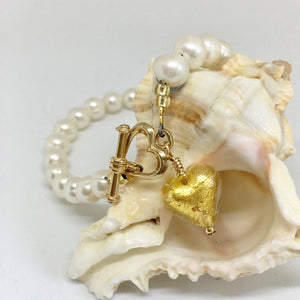 Bracelet with light (pale) gold Murano glass small heart charm on white freshwater pearls