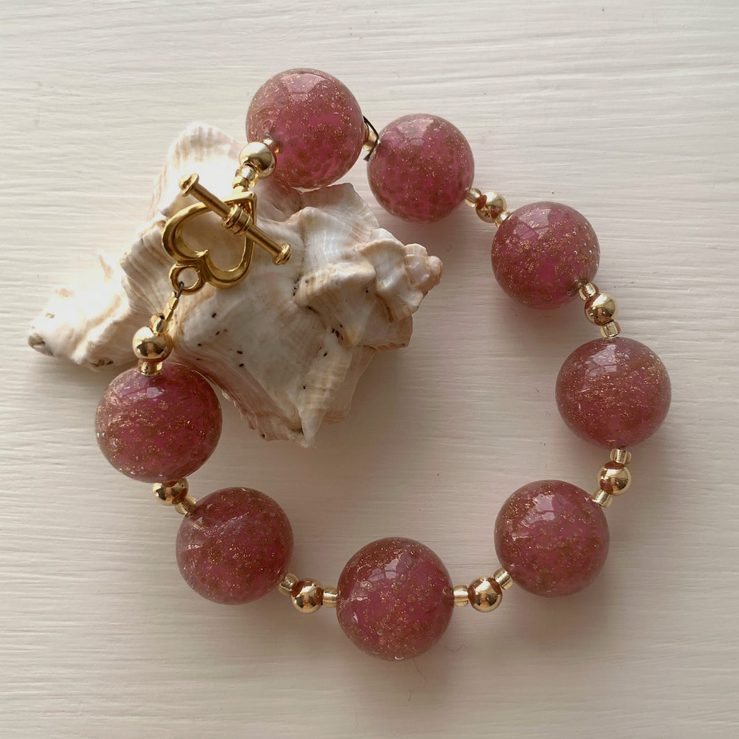 Bracelet with pink pastel and aventurine Murano glass medium sphere beads on gold