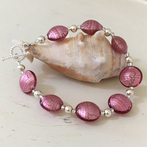 Bracelet with rose pink (cerise) Murano glass small lentil beads on silver beads and clasp