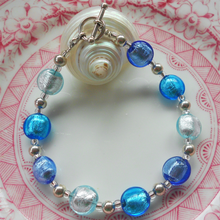 Bracelet with three shades of sky blue Murano glass mini lentil beads on silver