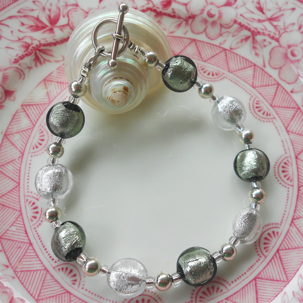 Bracelet with grey and clear crystal Murano glass mini lentil beads on silver beads and clasp