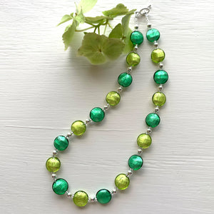 Necklace with dark and light green Murano glass small lentil beads on silver