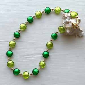 Necklace with dark and light green Murano glass small lentil beads on gold