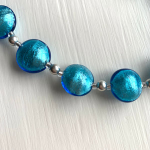 Necklace with turquoise (blue) Murano glass medium lentil beads on silver
