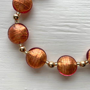Necklace with burnt orange (rose pink) Murano glass small lentil beads on gold