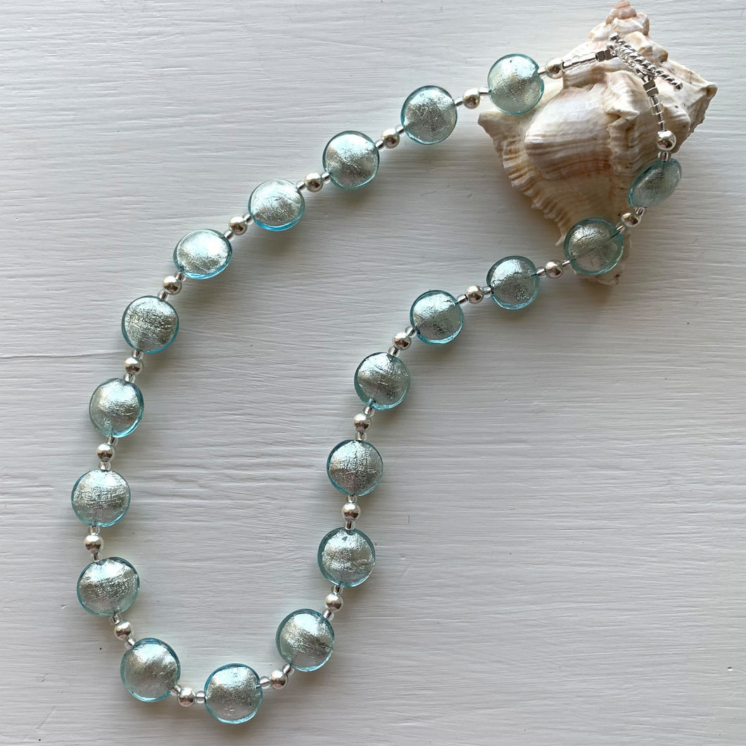 Necklace with aquamarine (blue) Murano glass small lentil beads on silver