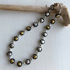 Necklace with black pastel, silver and gold Murano glass small lentil beads on silver beads and clasp