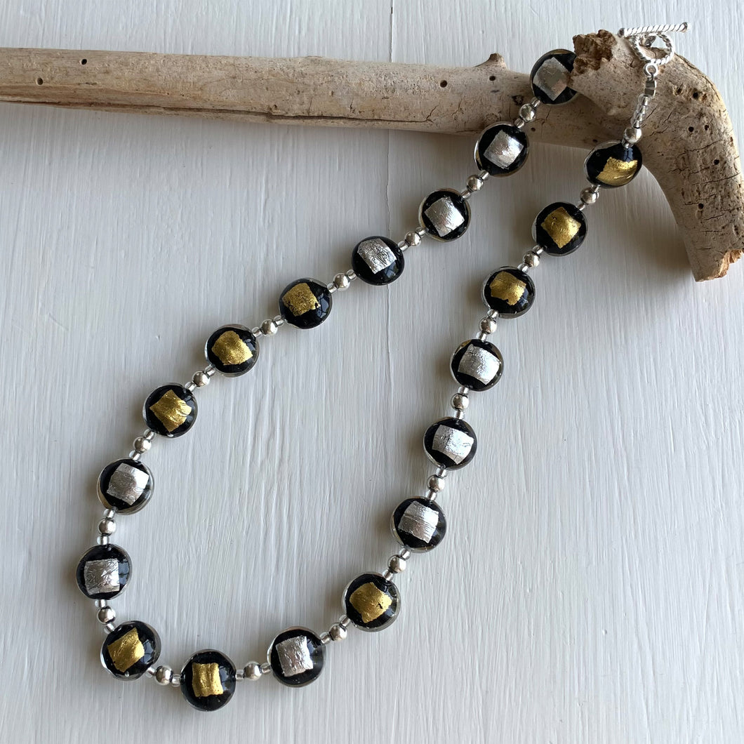 Necklace with black pastel, silver and gold Murano glass small lentil beads on silver beads and clasp