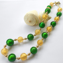 Necklace with dark green (emerald) and light gold Murano glass small sphere beads on gold