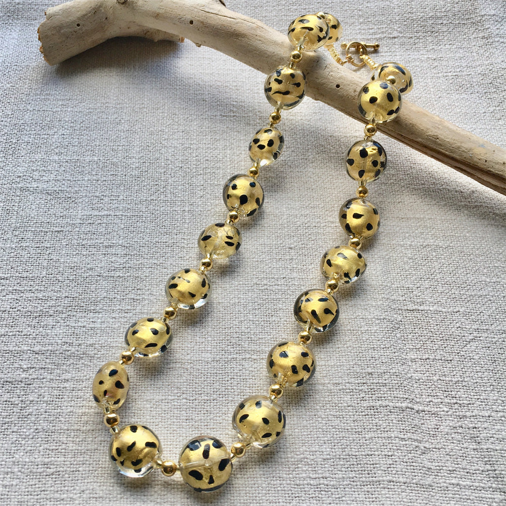 Necklace with light (pale) gold and black spots Murano glass medium lentil beads on gold