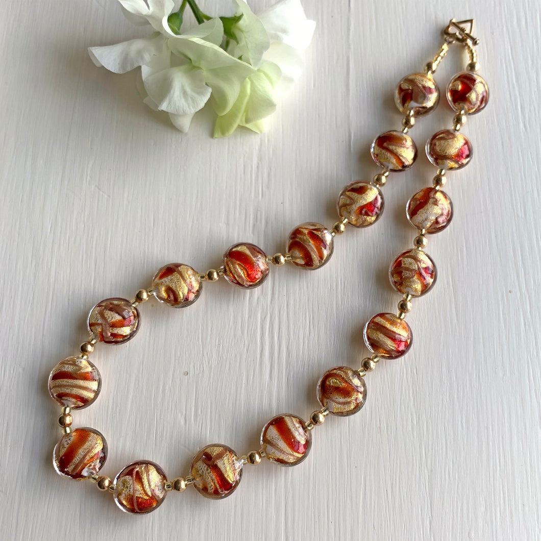 Necklace with red, white pastel, aventurine, gold dust Murano glass lentil beads on gold