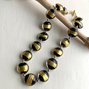 Necklace with black pastel striped in gold Murano glass large lentil beads on gold