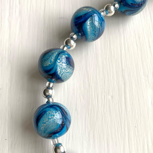 Necklace with byzantine blue pastel and white gold Murano glass sphere beads on silver