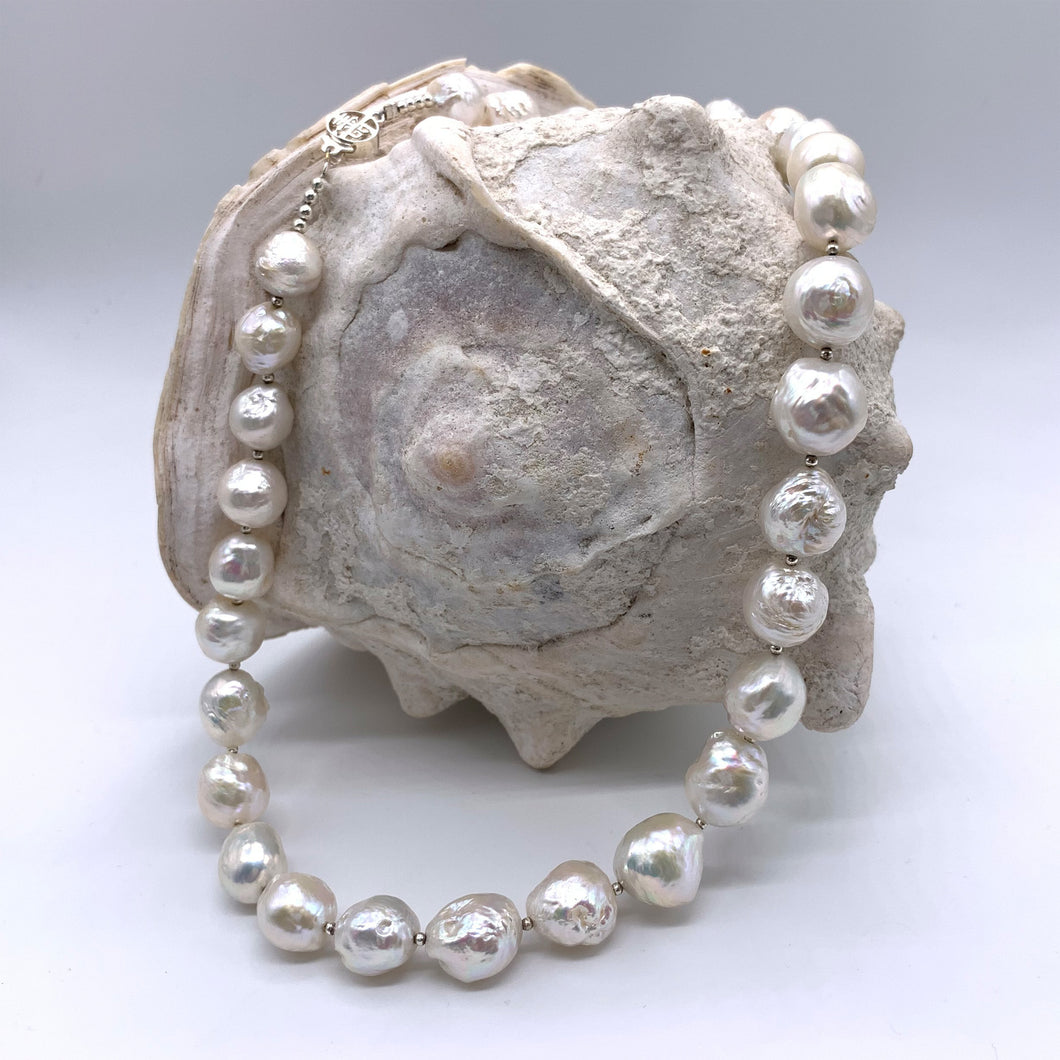 Necklace with large graduated cultured freshwater white baroque 'Kasumi' pearls