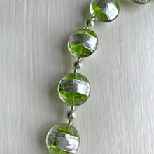 Necklace with green translucent and silver Murano glass medium lentil beads on silver