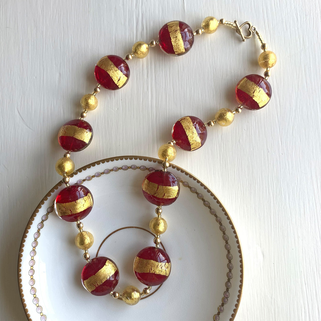 Necklace with red translucent and gold lentil and gold sphere Murano glass beads on gold