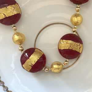 Necklace with red translucent and gold lentil and gold sphere Murano glass beads on gold