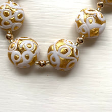 Necklace with white pastel appliqué over gold Murano glass medium lentil beads on gold