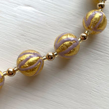 Necklace with purple pastel drizzle and gold Murano glass sphere beads on gold