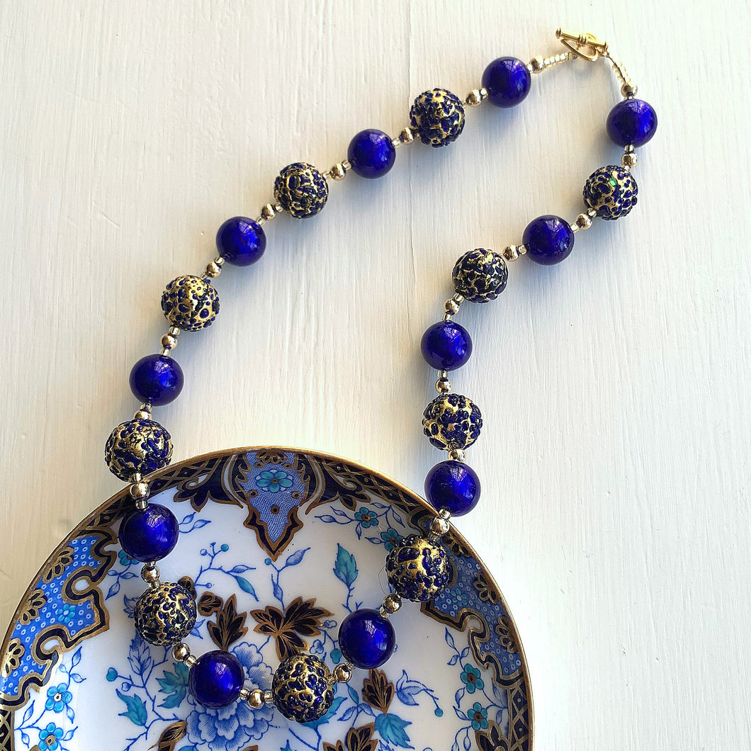 Necklace with dark blue (cobalt) and dark blue Murano glass sphere beads on gold