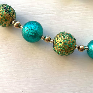 Necklace with speckled teal (green, jade) over gold and teal Murano glass sphere beads on gold