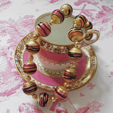 Necklace with pink black appliqué gold white pastel Murano glass sphere beads on gold