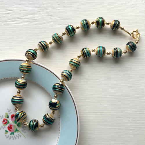 Necklace with teal (green, jade) black appliqué with gold Murano glass sphere beads on gold