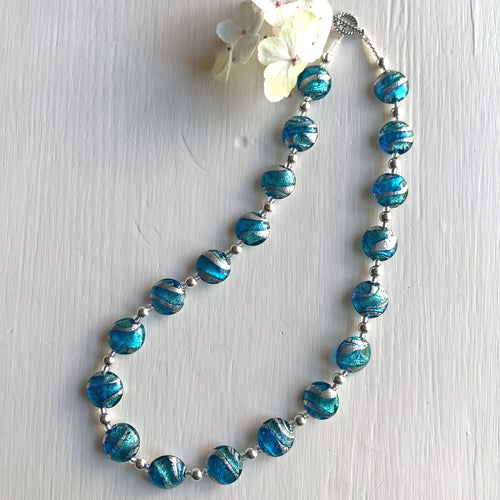 Necklace with turquoise (blue) and teal swirl over white gold Murano glass small lentil beads on silver