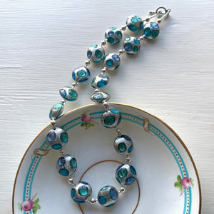 Necklace with shades of blue and white gold Murano glass medium lentil beads on silver