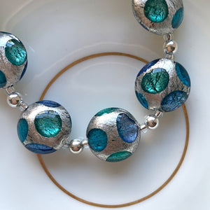 Necklace with shades of blue and white gold Murano glass medium lentil beads on silver