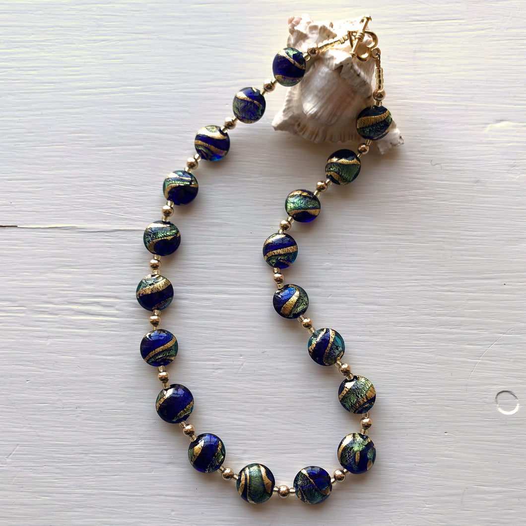 Necklace with dark blue (cobalt) teal gold swirl Murano glass small lentil beads on gold